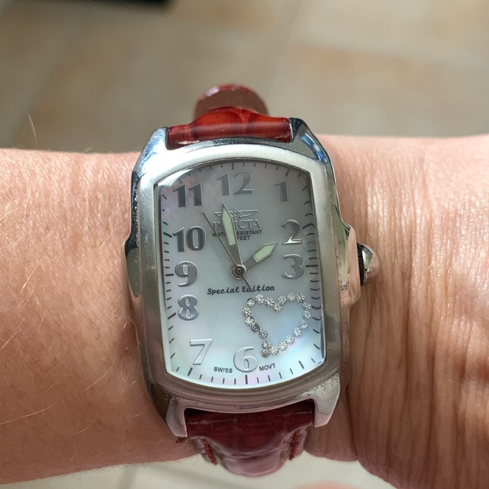 Invicta silver face watch